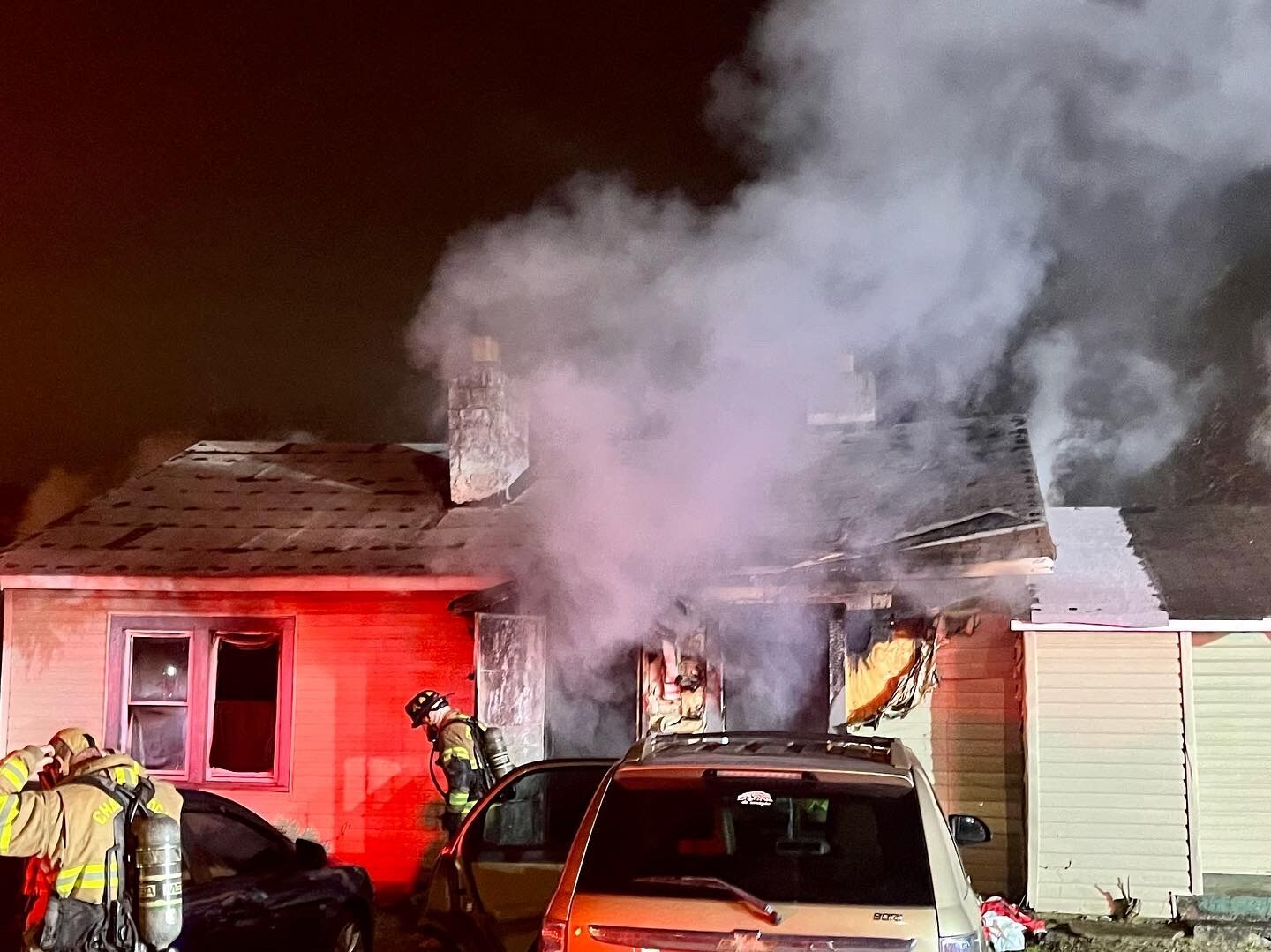 Early morning house fire displaces three people, two pets